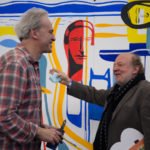 Laurent Corvaisier et Alain Serres devant la peinture de Laurent Corvaisier